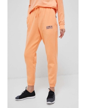 Under Armour spodnie dresowe kolor pomarańczowy gładkie