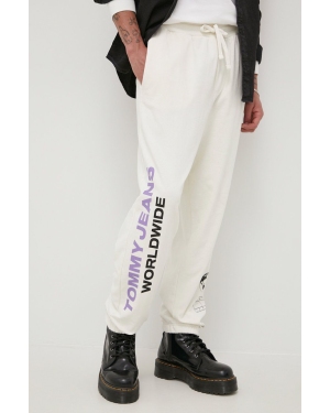 Tommy Jeans Spodnie bawełniane DM0DM12440.PPYY męskie kolor beżowy z nadrukiem
