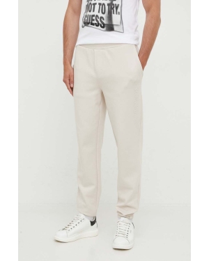 Calvin Klein spodnie dresowe kolor beżowy gładkie