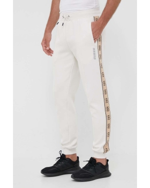 Guess spodnie dresowe MICKEY męskie kolor beżowy z nadrukiem Z2YB09 KB3P2