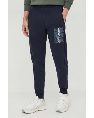 Calvin Klein spodnie dresowe bawełniane kolor granatowy z nadrukiem