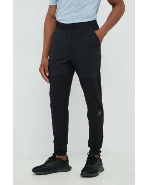 New Balance spodnie treningowe Q Speed męskie kolor czarny