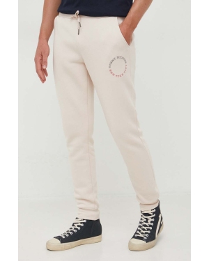 Tommy Hilfiger spodnie dresowe kolor beżowy z nadrukiem