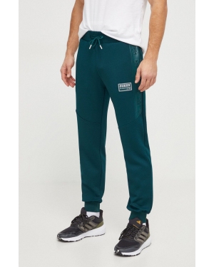 Guess spodnie dresowe kolor zielony z aplikacją