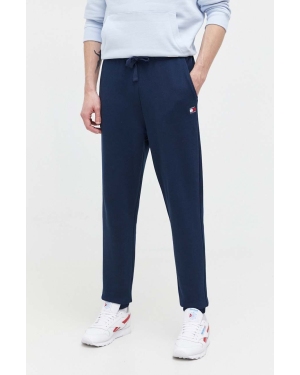 Tommy Jeans spodnie dresowe bawełniane kolor granatowy gładkie