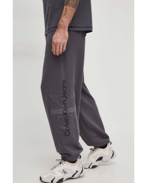 Calvin Klein Jeans spodnie dresowe bawełniane kolor szary z aplikacją