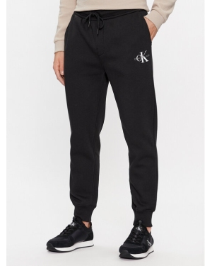 Calvin Klein Jeans Spodnie dresowe Monologo J30J324685 Czarny Regular Fit