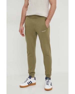 Calvin Klein spodnie dresowe kolor zielony gładkie