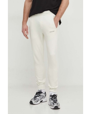 Calvin Klein spodnie dresowe kolor beżowy gładkie