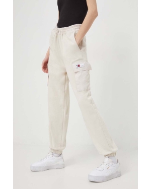 Tommy Jeans spodnie dresowe kolor beżowy gładkie