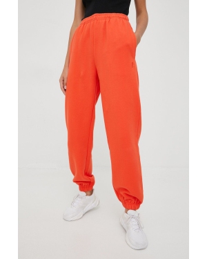 P.E Nation spodnie dresowe bawełniane damskie kolor pomarańczowy gładkie