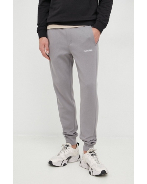 Calvin Klein spodnie dresowe męskie kolor szary gładkie