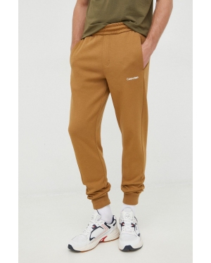 Calvin Klein spodnie dresowe męskie kolor brązowy gładkie