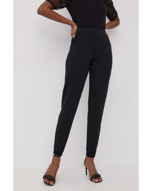 Spanx spodnie dresowe damskie kolor czarny gładkie