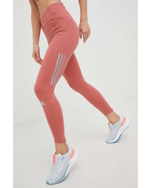 adidas Performance legginsy do biegania Own the Run Winter damskie kolor pomarańczowy z nadrukiem